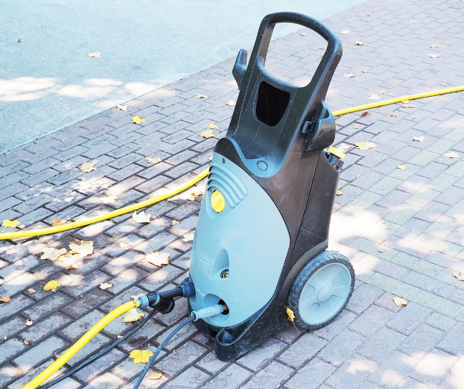 Sutherland pressure washer on concrete paving slabs
